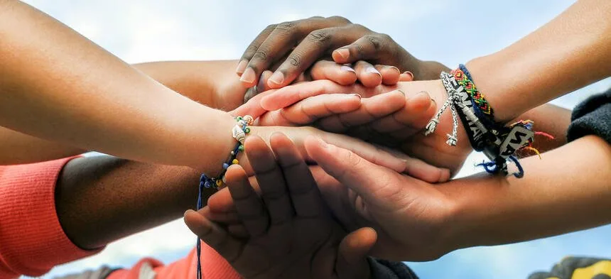 Hands joined together in unity